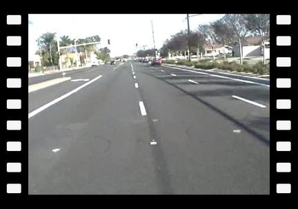 Car Changes Lanes in Front of Motorcyclist.wmv