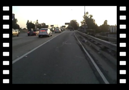 Car Exiting Freeway Late Almost Hits MC.wmv